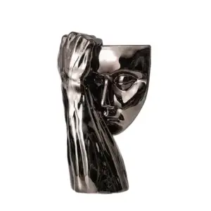 Hand Touching Face Ornament