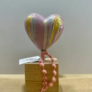 Ceramic Heart on wood